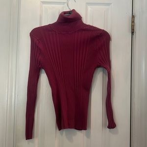 Hannah Jones size medium purple turtleneck.